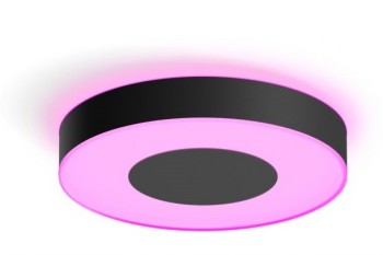 Musta pyöreä kattovalaisin, jonka reuna ja pohja hehkuvat pinkkiä valoa.